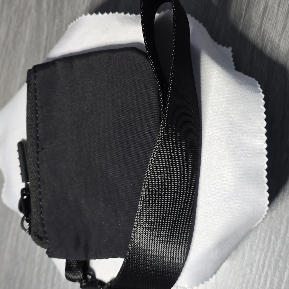 Black Coin or ID Holder With A Wrist Strap